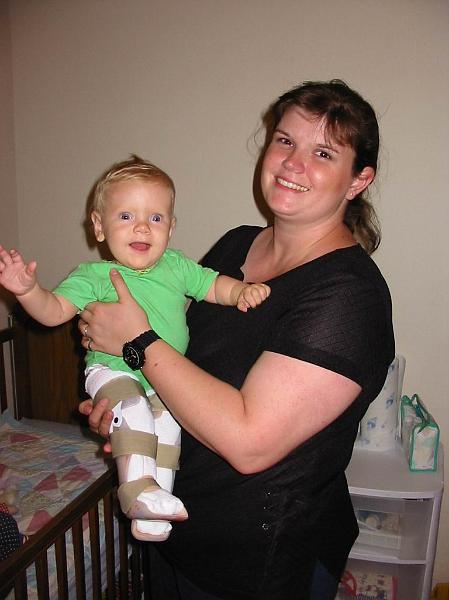 0-19.JPG - Mom with Kika wearing her first pair of braces to help straighten her clubfeet.