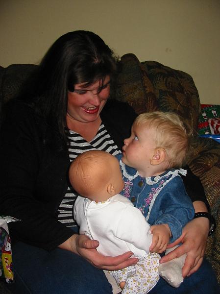 1-05.JPG - Christmas 2002 - Kika with her Christmas present, her very own baby.