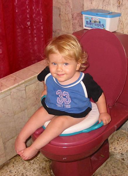 2-07.JPG - Kika has graduated from her little potty to the big toilet using the padded seat from her potty.