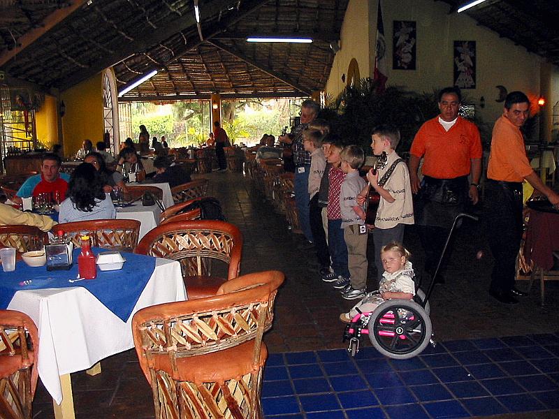 2-17.JPG - Here is Kika on her first trip out with the kids singing team. We go singing and witnessing in the restaurants here in Mexico. She was a real hit with everyone she met.