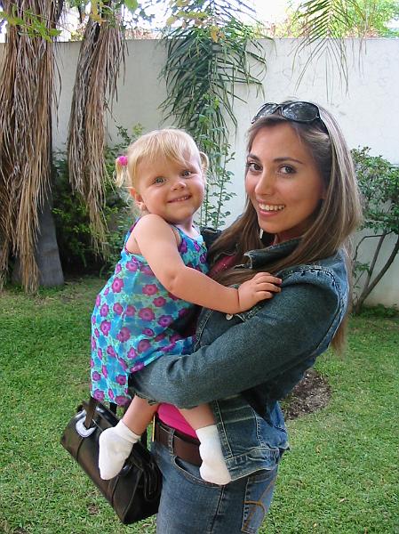 2-22.JPG - Kika with a new friend who attended one of our missionary activities--a combined barbeque and Bible study.