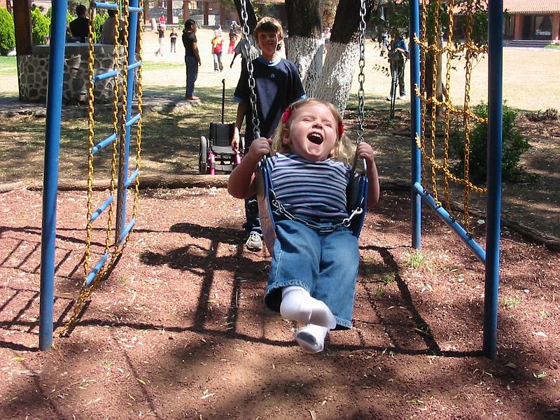 3-26.JPG - Kika being swung by her big brother, Tom.