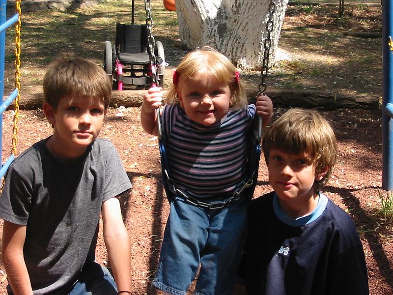 3-27.JPG - Kika with big brothers, Dave (left) and Tom (right).
