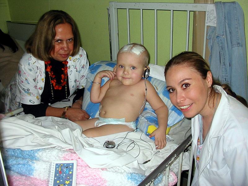 4-35.jpg - Patti, the social worker and Milagros, the doctor, saying goodbye to Kika.