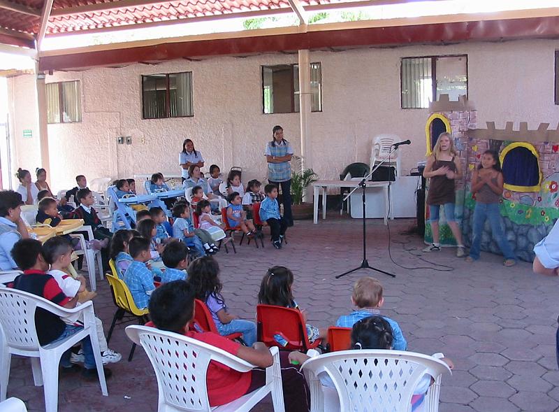 6-24.JPG - Doing a puppet show for a local school.