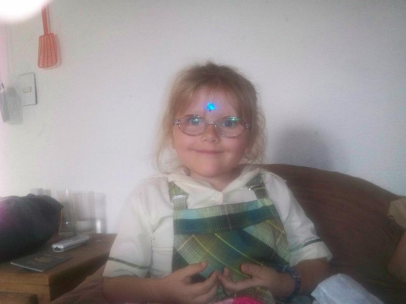 7-16.jpg - Kika in her school uniform. The star is there for, um, for fun!